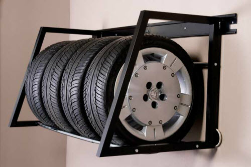 Wall-mounted garage tire racks
